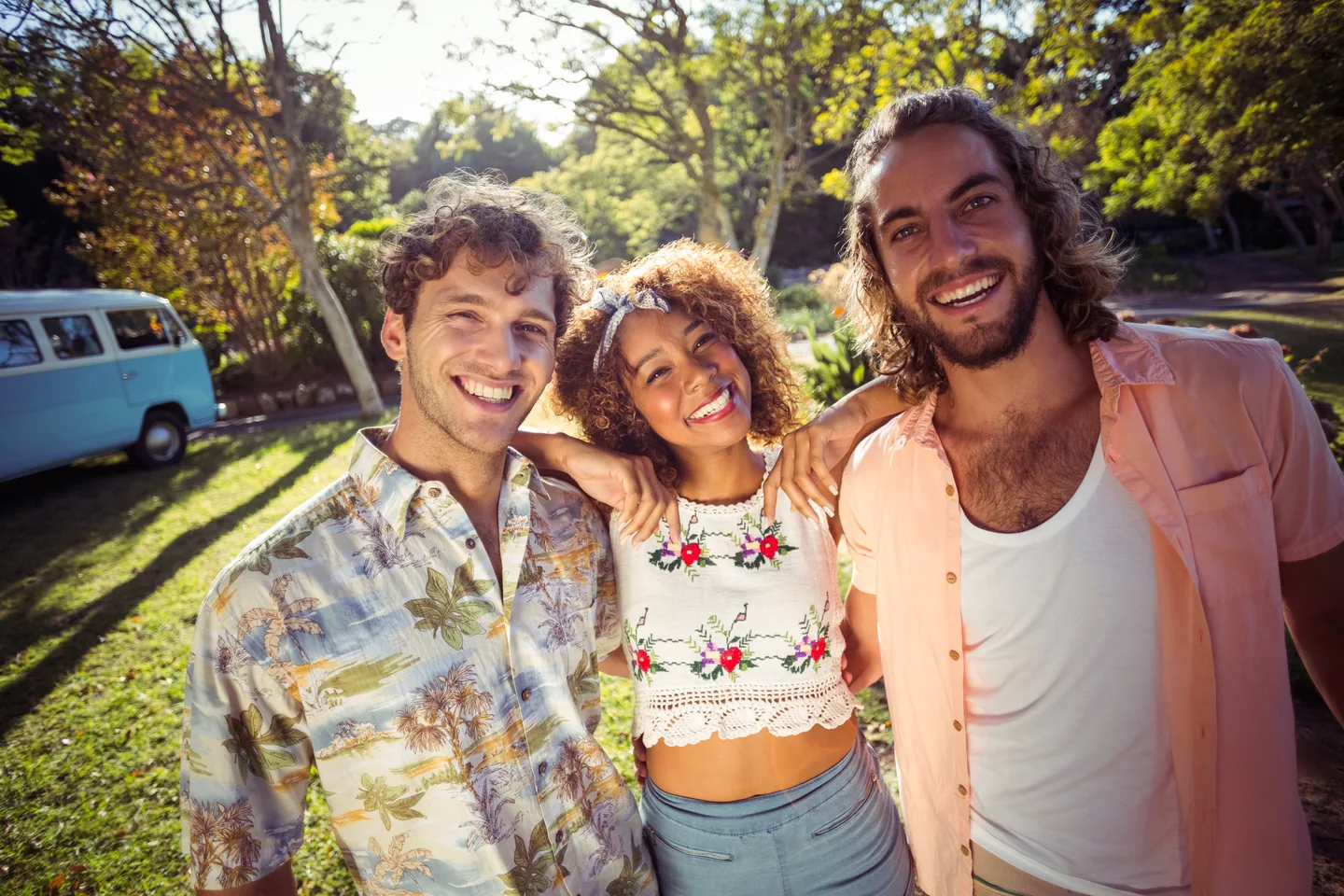 Friends smiling together during a relaxed day in the park